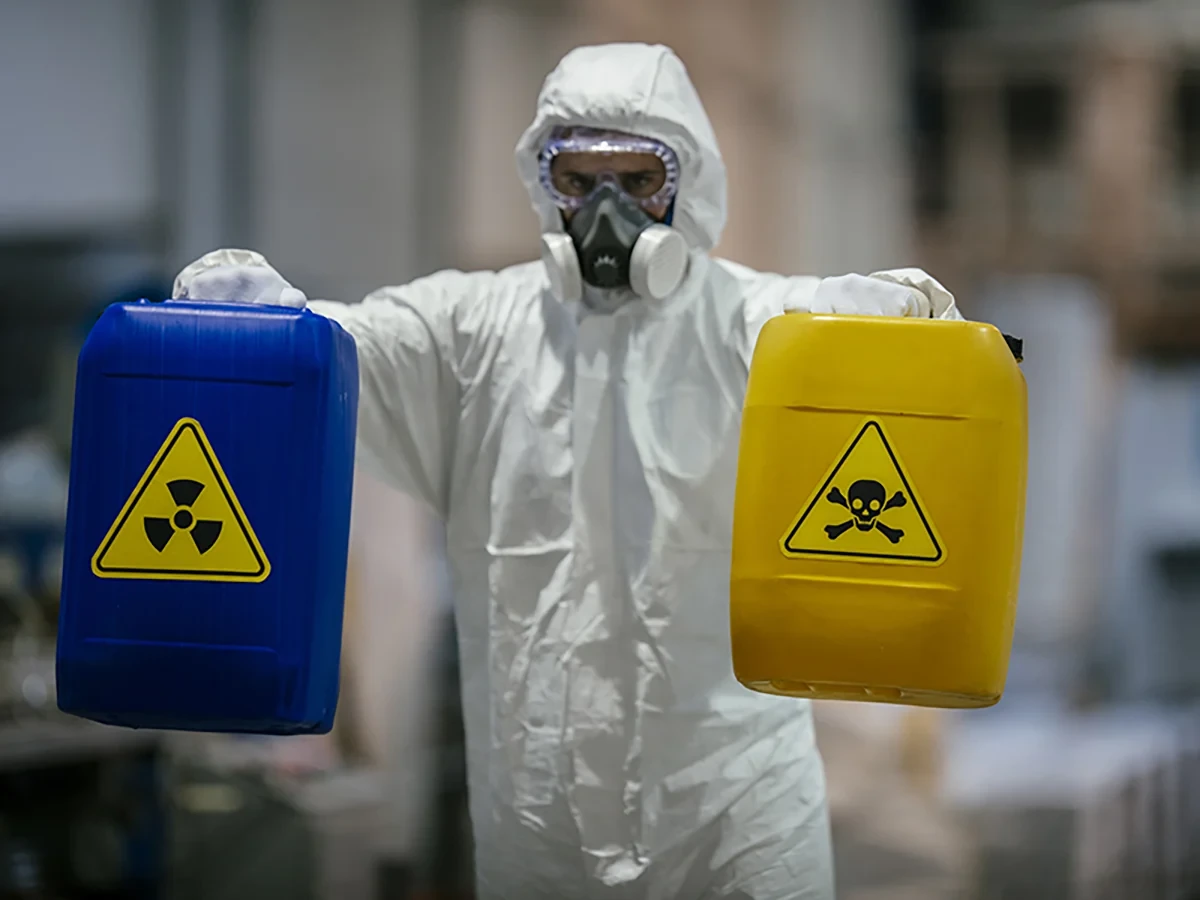 Biohazard cleanup technicians in protective equipment at a remediation scene in Appleton, WI